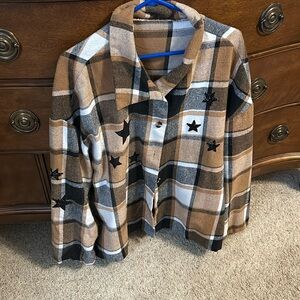 Check out this super comfy oversized flannel jacket. Perfect pre own condition.
